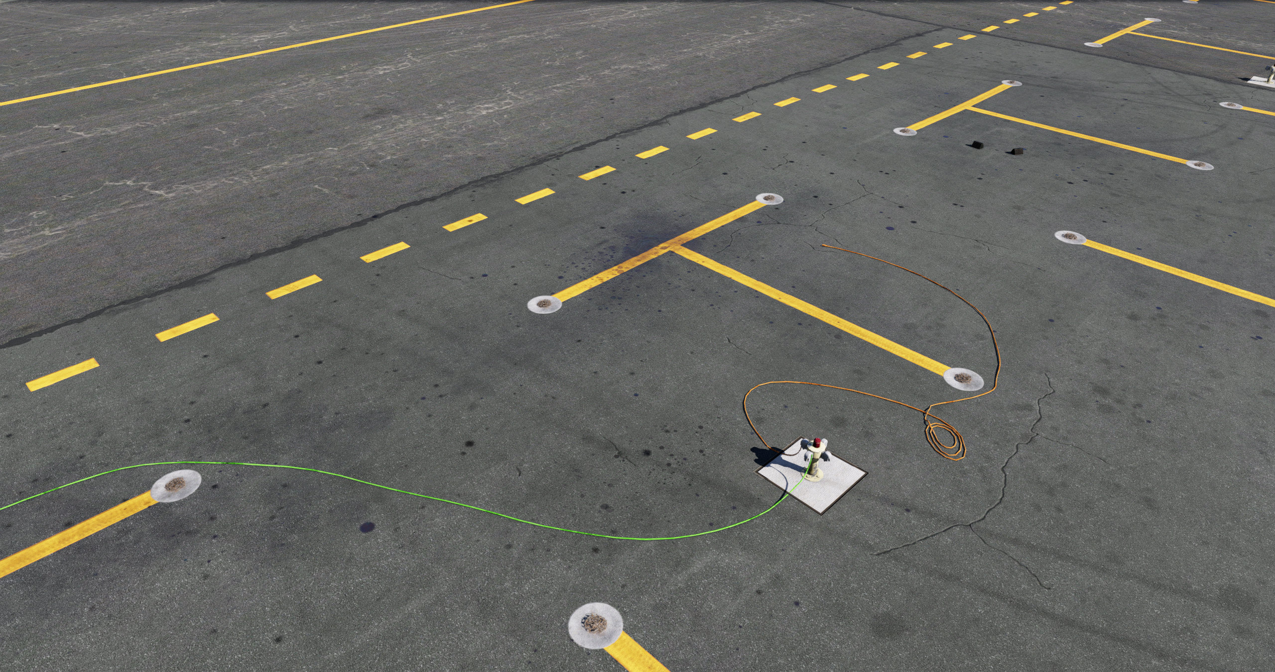 View of ramp at KTEX Telluride Regional Airport in X-Plane 12 with oil spills grunge and in ground power pedestals with power cords coming from them