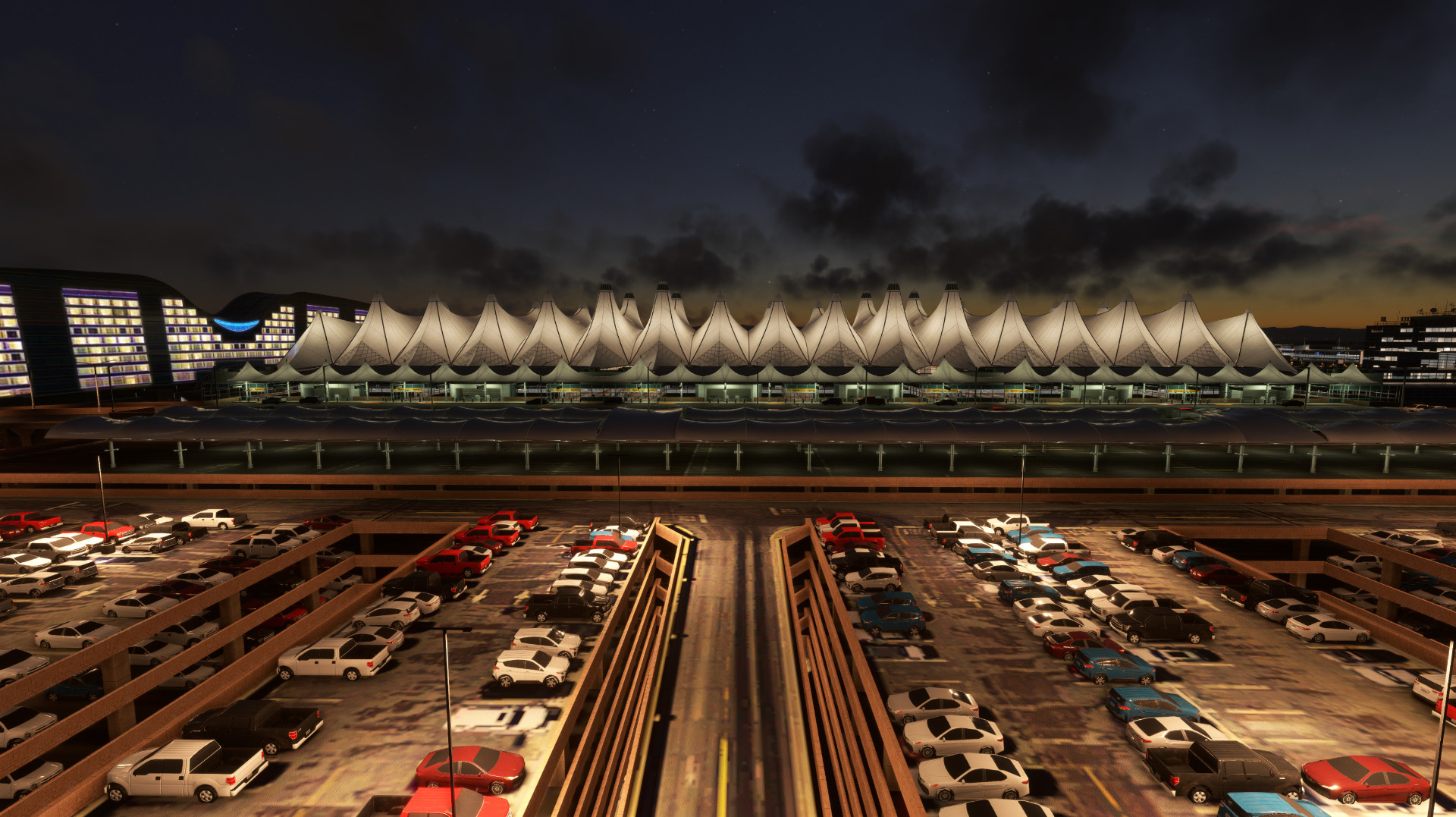 Denver terminal and parking lot illuminated at night for Denver International Airport (KDEN) by X-Codr Designs in MSFS